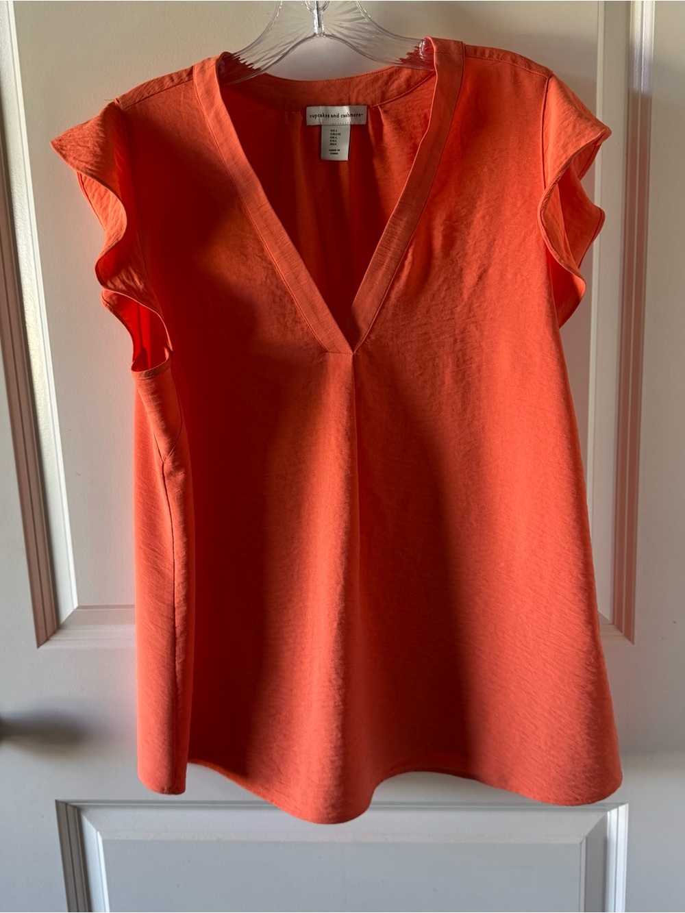 Cupcakes and cashmere blouse